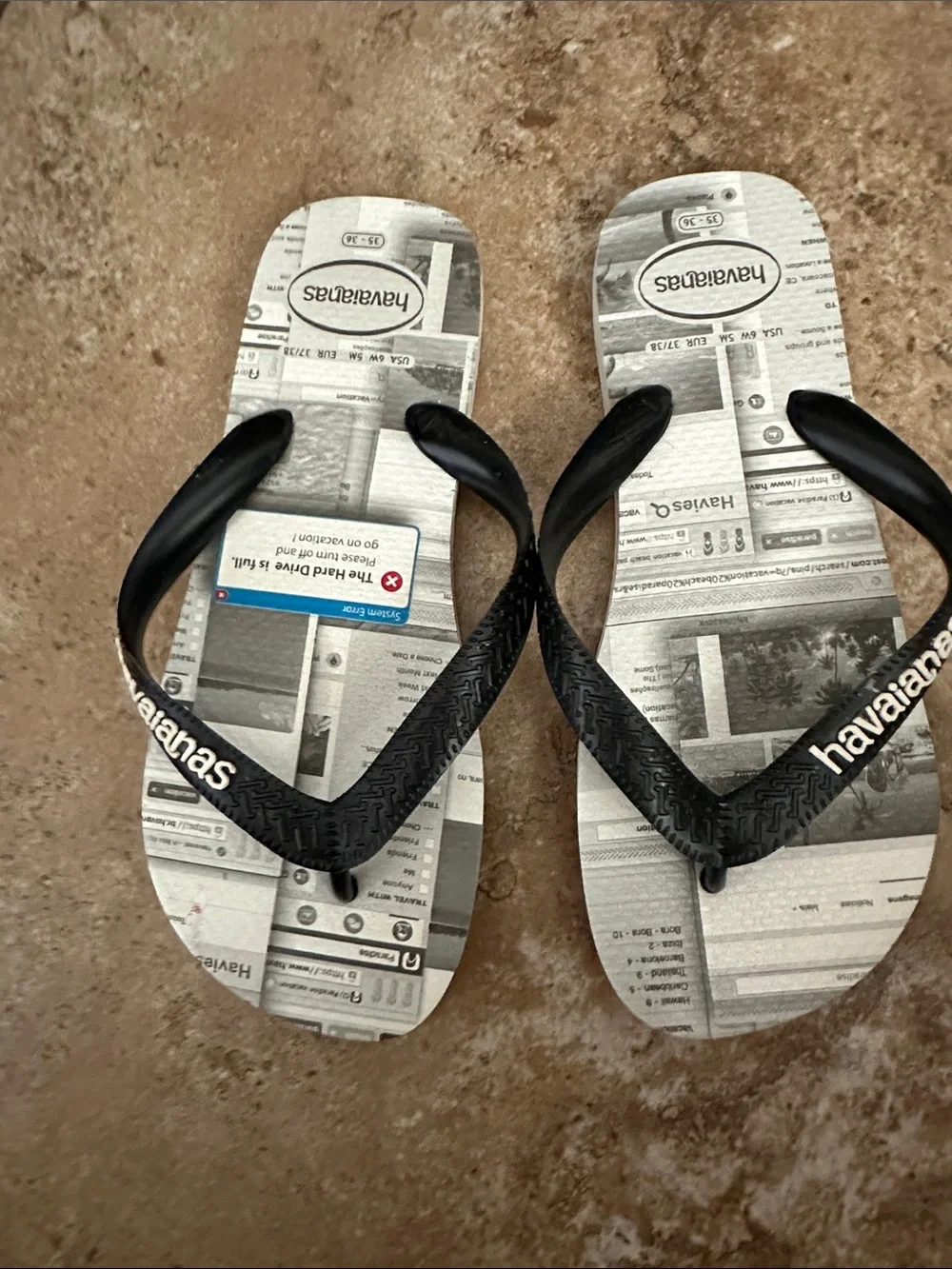 Havaianas Black Straps with Gray Newspaper Print Footbed Sz 6